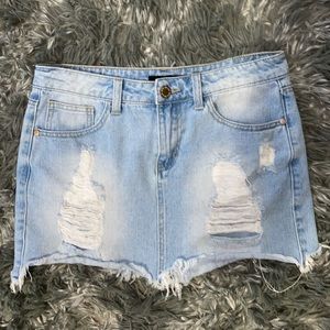 Light Wash Distressed Denim Skirt